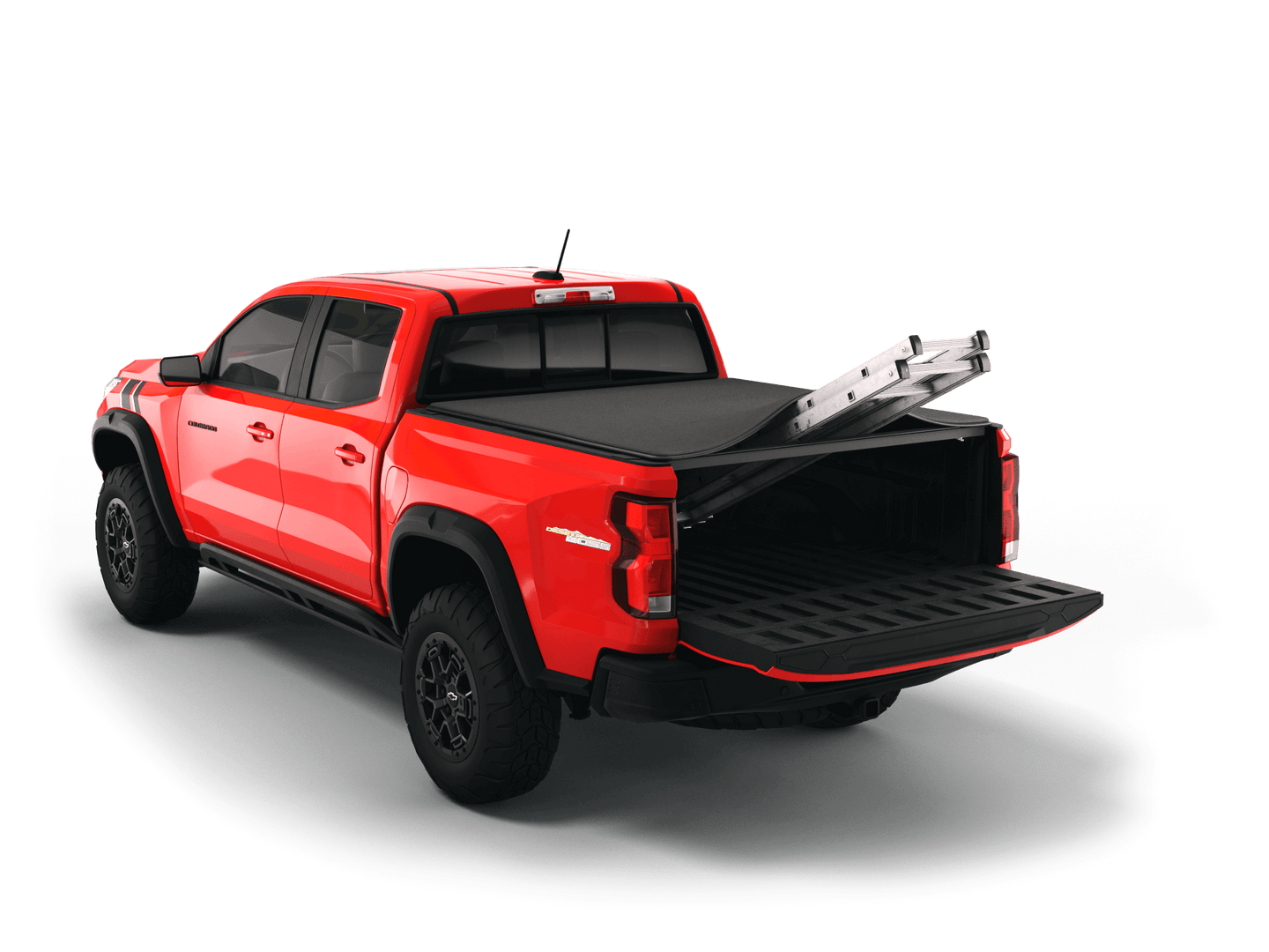 Red Chevrolet Colorado / GMC Canyon with Sawtooth Stretch expandable tonneau cover rolled up at cab